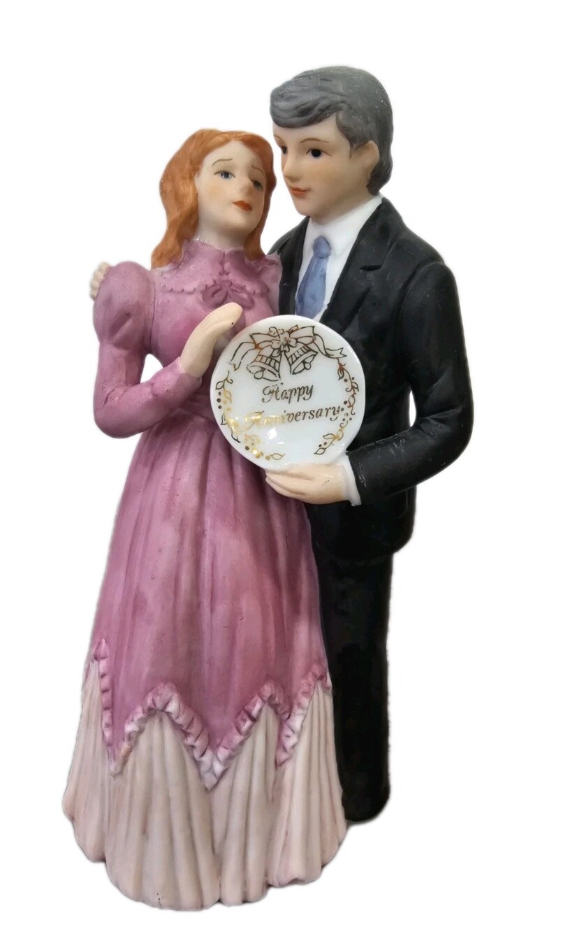 vintage Enesco "Treasured Memories" figurine of a couple celebrating their...